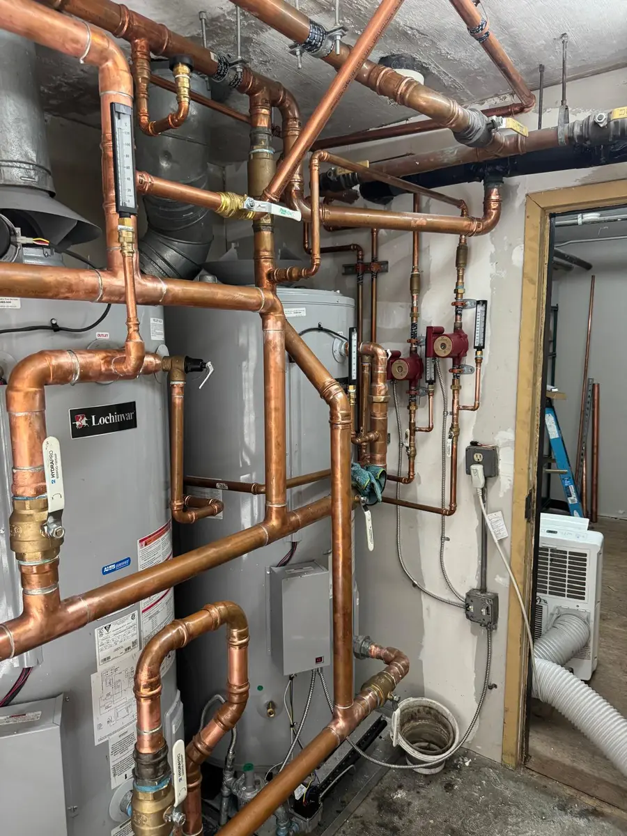 Copper manifold and valves in a commercial mechanical room